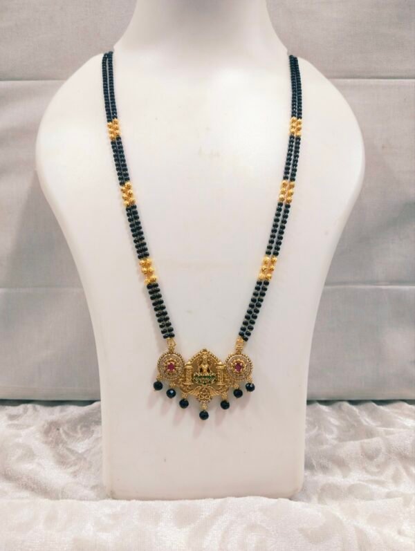 Long black beads with Lakshmi Devi pendant